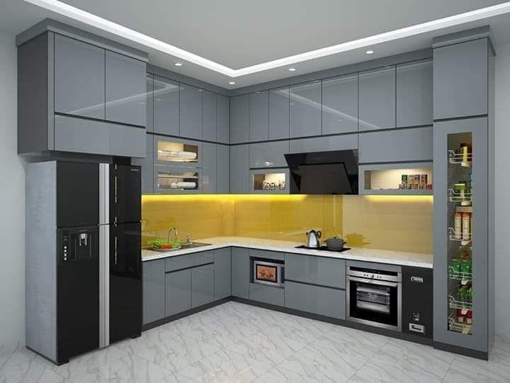 Mẫu Tủ bếp chữ L cho chung cư nhỏ (bếp 5–8m²) Tủ bếp chữ L phủ Acrylic bóng gương